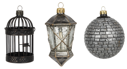 Vintage decorative black cage, rustic lantern with glass, and round silver mosaic ornament set, perfect for holiday decor or interior design