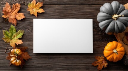 White blank paper with an autumn leaves and pumpkin. 2