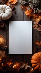 White blank paper with an autumn leaves and pumpkin. 4