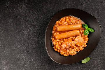 Cassoulet beans with meat and sausage french cuisine vegetables dish natural product tasty snack fresh delicious gourmet food background on the table rustic top view copy space