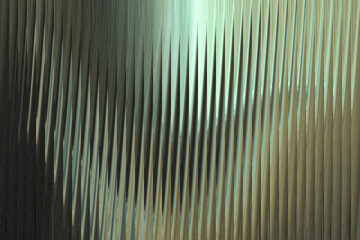 A closeup abstract view of textured vertical lines with a metallic sheen, creating a sense of depth and movement