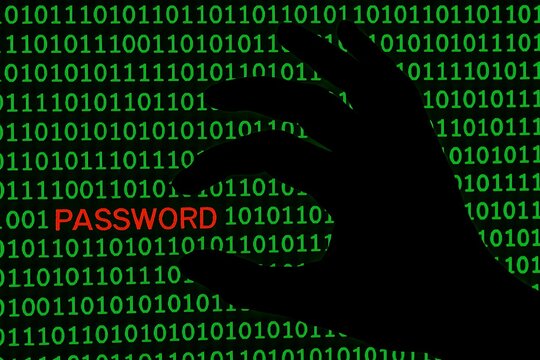 Hacker Hand Password Theft in Green Binary Code Cybersecurity Concept.