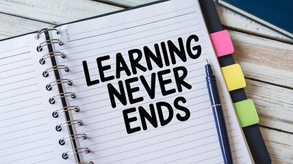Inspiring quote 'Learning Never Ends' written in bold black letters on a lined notebook page with a blue pen and colorful sticky notes, perfect for educational or motivational content.