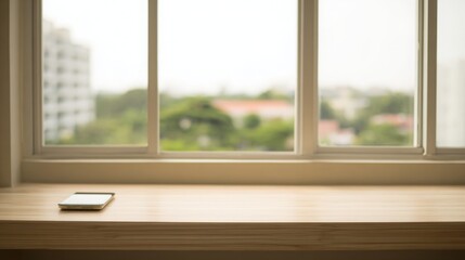 organized. Minimalist workspace featuring a closed device on a wooden table, exuding calm and productivity in warm tones. lifestyle magazines.
