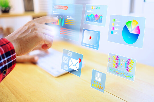 virtual analytics dashboard concept with hand pointing to touch interact an interface of virtual display to summarise data to business information report