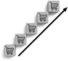 Concrete cubes with shopping cart icons arranged in ascending steps, bold arrow indicating upward trend, isolated on white background, concept of sales growth
