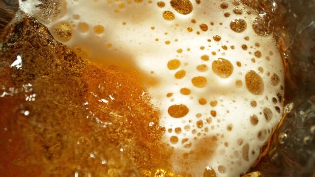 Super Slow Motion of Pouring Beer into Pint Glass, Top Down View, Rotating Camera Move. Filmed on High Speed Cinema Camera, 1000 fps.