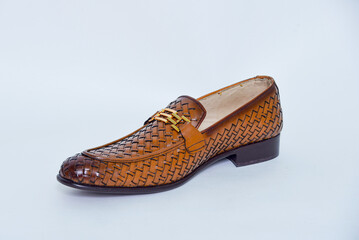 Elegant men's brown woven leather loafer with gold buckle detail for sophisticated style