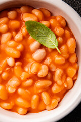 Beans tomato sauce vegetables dish natural product tasty snack fresh delicious gourmet food background on the table rustic top view copy space keto and paleo diet vegan and vegan food