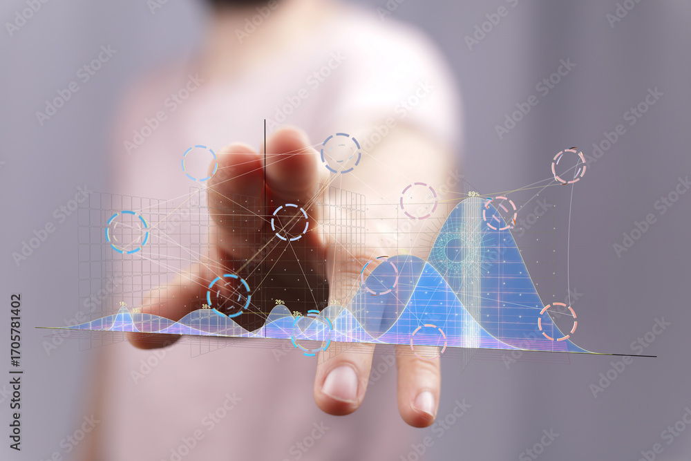 Poster person interacting with a digital graph, showing data analysis and visualization.