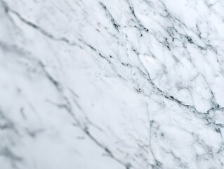 A frozen stone wall covered in white snow and abstract ice crystals with a cold, blue winter sky in the background