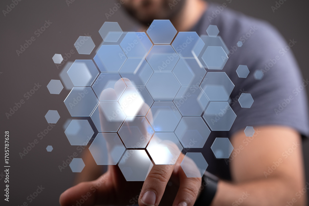 Poster abstract image of a person interacting with a futuristic hexagon shaped interface. perfect for techn