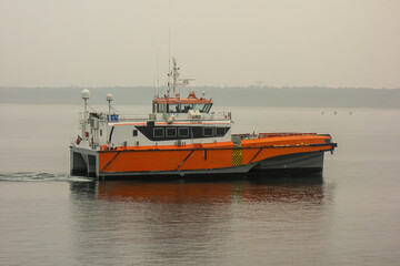 Modern Catamaran Vessel Sailing on Calm Sea. Offshore Transport, Marine Engineering, Maritime Industry, Coastal Travel, Shipping, and Nautical Navigation Concept