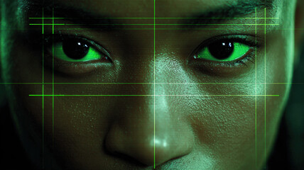 Digital face portrait with green cyberpunk effects and grid overlay representing futuristic technology concept