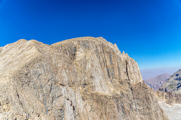 The scenic view of Reşko summit in the Sat (Cilo) mountains, Serpel and Horgedim plateau with its glaciers and glacier rivers in Hakkari, Turkey.