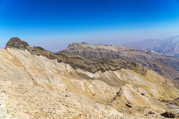 The scenic view of Reşko summit in the Sat (Cilo) mountains, Serpel and Horgedim plateau with its glaciers and glacier rivers in Hakkari, Turkey.