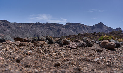Volcanic soil and rocky background
