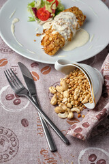 Delicious dish with nuts and vegetables served elegantly