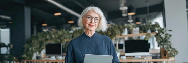 Caucasian mature female professional in modern office with tablet
