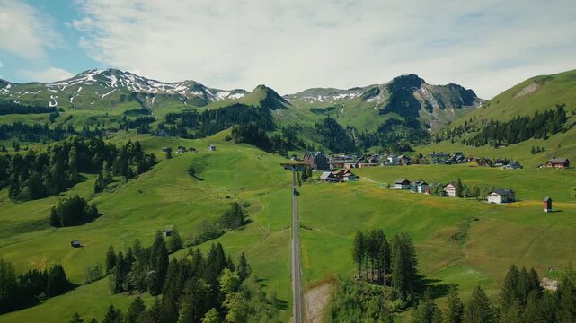 Ski lift and tourist resort in Stoos in Swiss Alps at autumn, aerial drone view