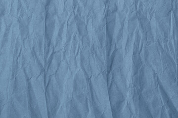 Abstract wrinkled blue crumpled paper texture background