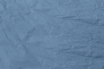 Abstract wrinkled blue crumpled paper texture background