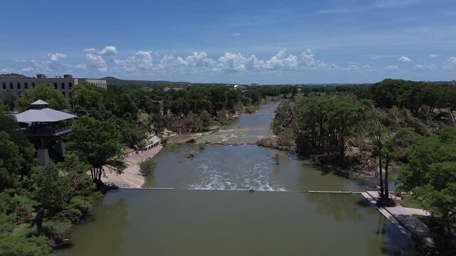The Guadalupe River cuts through Kerrville, Texas, after a devastating flood in the summer of 2025. 