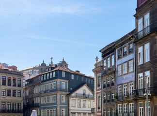 Obraz premium Historic facades with azulejo tiles and balconies in Porto, Portugal. Old town architecture with