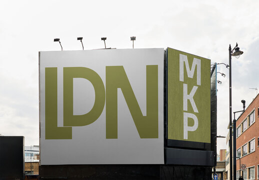 Two big square billboard in a London building facade