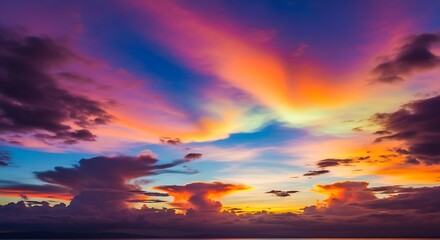 Fototapeta premium Celestial Radiance: A Majestic Sunset Symphony of Purple, Orange, and Glowing Anvil Clouds.