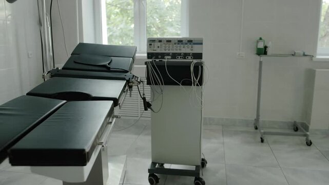 A room for performing surgical operations with an electrocoagulator, a couch and a lighting lamp, emergency