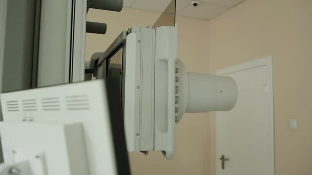 Modern X-ray machine in the X-ray room procedure room. Carrying out diagnostic procedures with X-rays, background