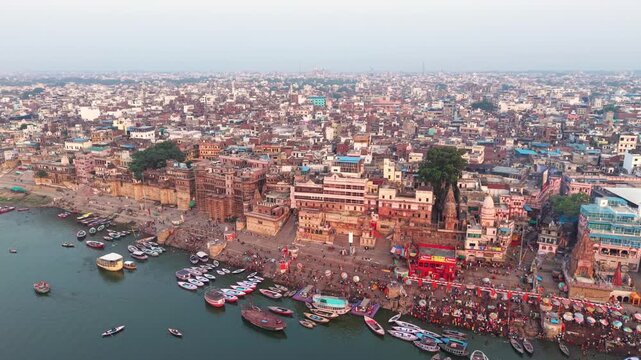 Varanasi, India: Aerial view of famous Dashashwamedh Ghat in ancient holy city on Ganges river - landscape panorama of Southeast Asia from above
