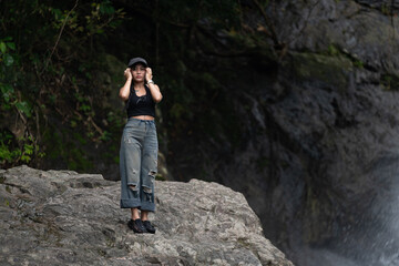 Thai Girl at Water-falls and National Parks in Thailand