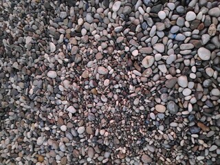 Pile of rocks with some blue rocks in it