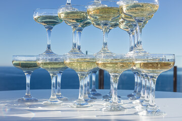Champagne tower of sparkling wine glasses