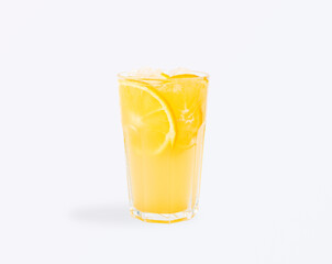 Bright and refreshing yellow lemonade with lemon slices and ice cubes served in a tall glass, perfect summer drink for cafe, bar or restaurant, isolated on white background