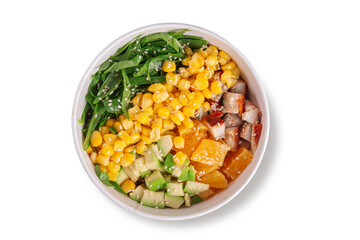 Bright poke bowl with juicy chicken pieces, fresh avocado, sweet corn, orange slices and greens, topped with sesame seeds, served in eco paper bowl, top view