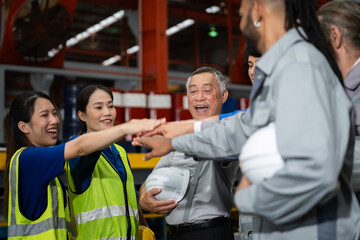 Team building event in industrial setting celebrating success and collaboration group activity positive workplace environment