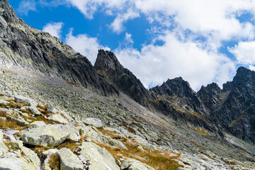 A beautiful sunny day in the mountains. The landscape seen from the valley.