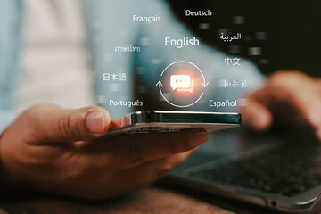 Businessman is using smartphone for online instant translation with multilingual interface showing translation from various languages, concept of online translation technology