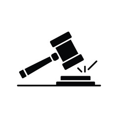 Black silhouette of a gavel striking a sounding block