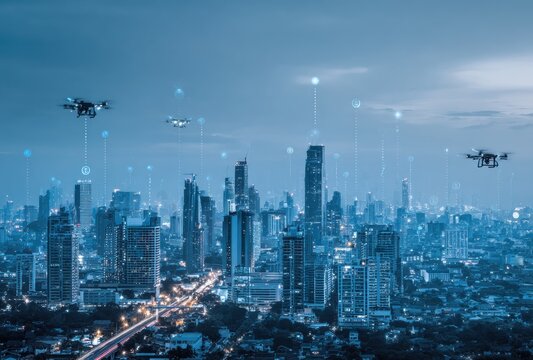 A cityscape illuminated at dusk features multiple drones hovering, linked by glowing digital nodes, against a skyline filled with modern, tall buildings