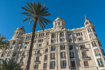 Fototapeta premium Architecture and palm trees in Alicante, Spain