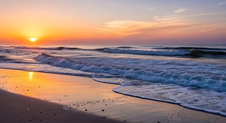 Fototapeta premium Sunrise over the ocean beach waves.
