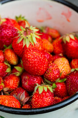 bright tasty juicy strawberries lie in a jar just picked