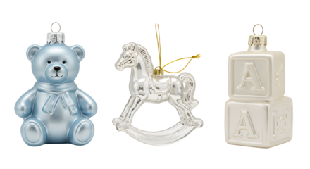 Blue teddy bear, white rocking horse, and white alphabet block Christmas ornaments on a white background, perfect for holiday decoration