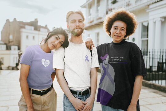 World cancer day fashion campaign, diverse people wearing awareness t-shirts - Powered by Adobe