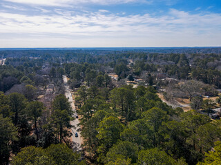 Aerial landscape in during winter of forested residential area in Decatur Atlanta Georgia