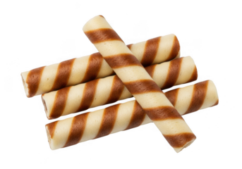 Stack of chocolate and vanilla wafer rolls isolated on transparent background